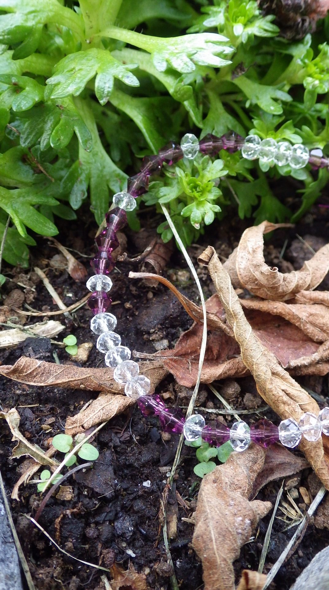  Purple and clear crystal with silver findings  7.5-9”  $14.95 