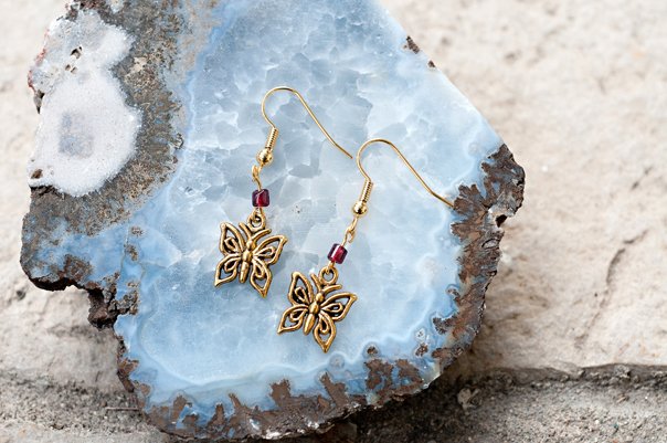  Gold butterflies and garnet with gold findings  $12.95 