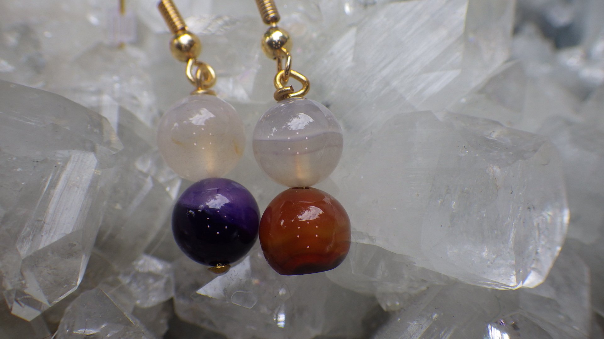  Purple-dyed agate with gold accents and gold findings  $12.95 