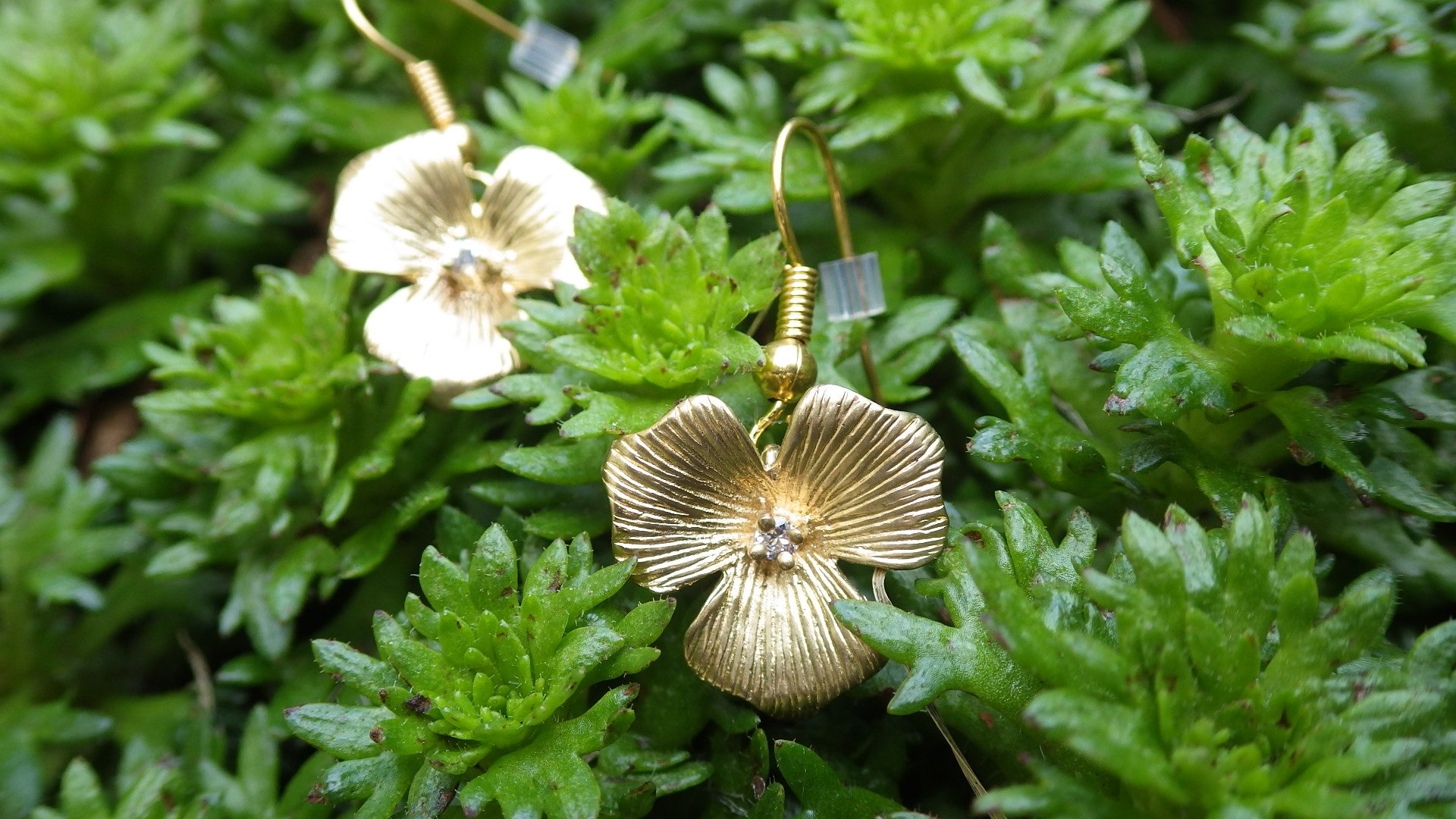  Gold flowers with crystal centres and gold findings  $12.95 