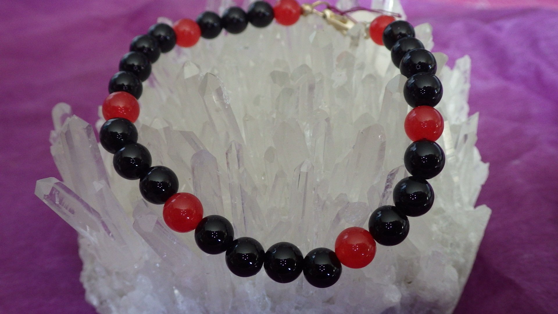  Red and black-dyed agate with silver findings  7.5-8”  $14.95 