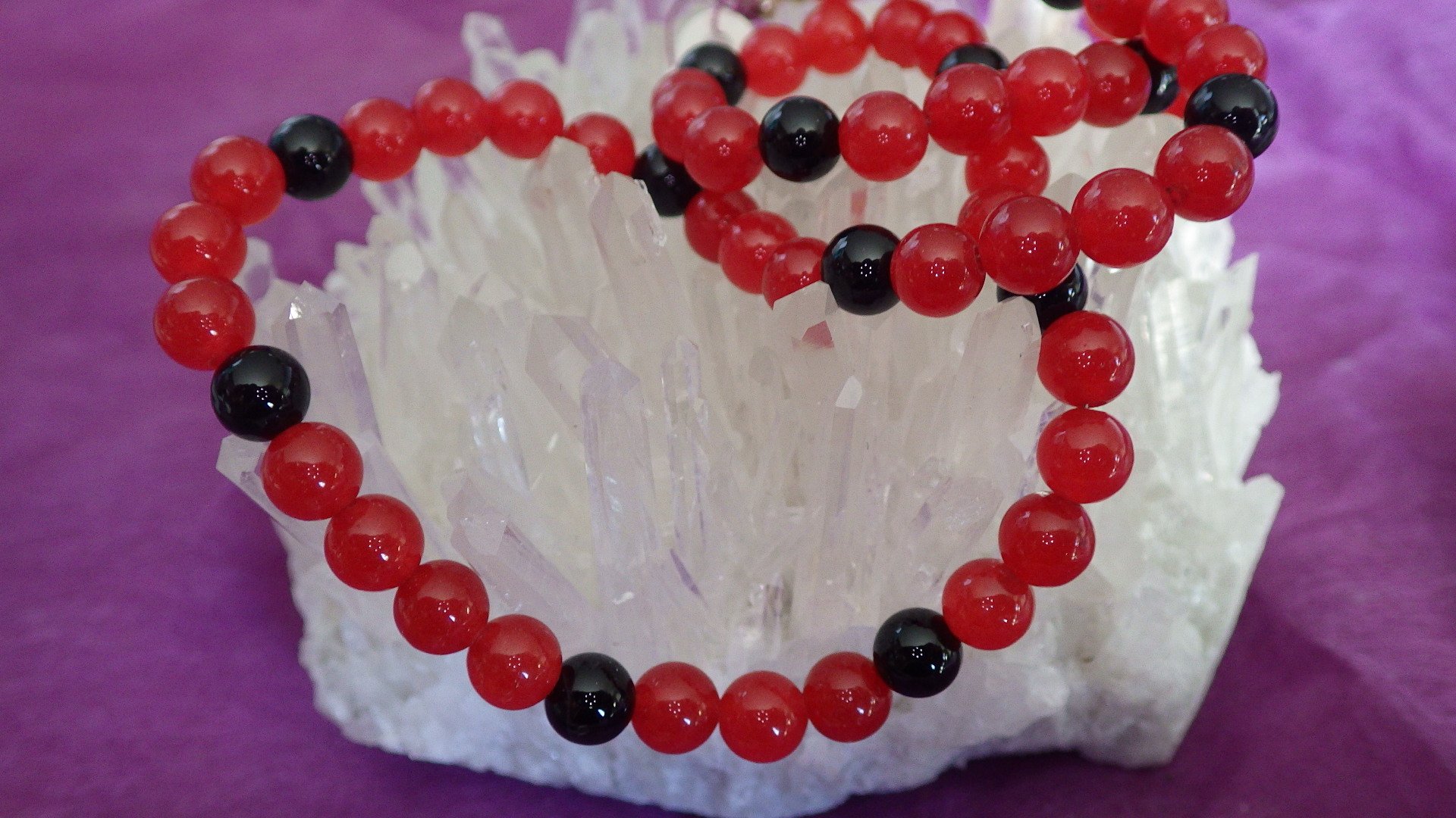  Red-dyed agate with black agate and silver findings  18”  $29.95 