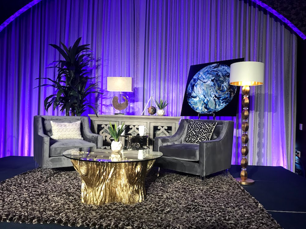 The final set design for the event. Note the "space nuggets" rug!