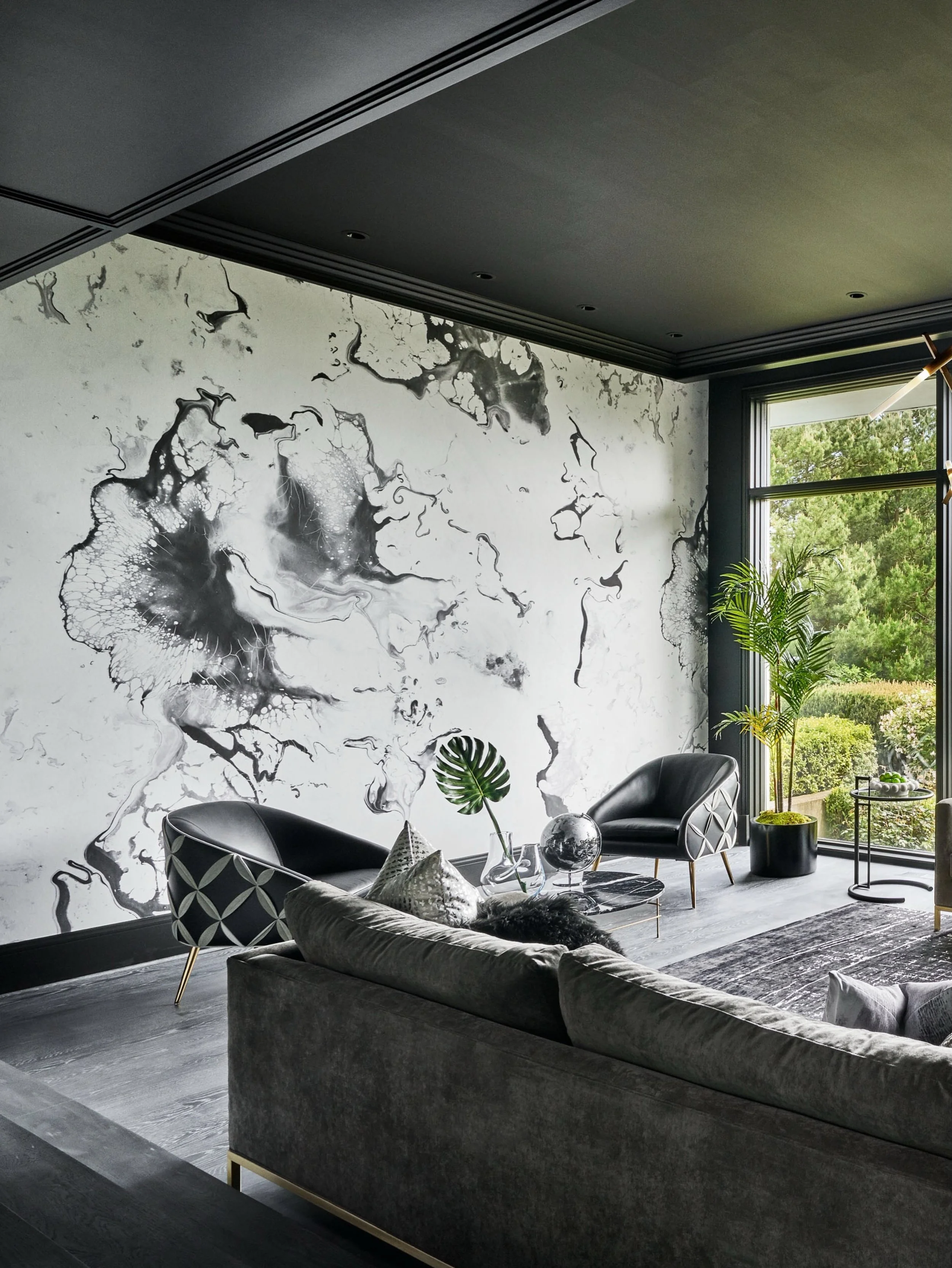 Sometimes the wall itself becomes the art.

A mural-style wallpaper transforms a large, empty wall into an immersive focal point, adding depth, movement, and a quiet sense of drama that brings the entire room to life.

Would you embrace this look in 