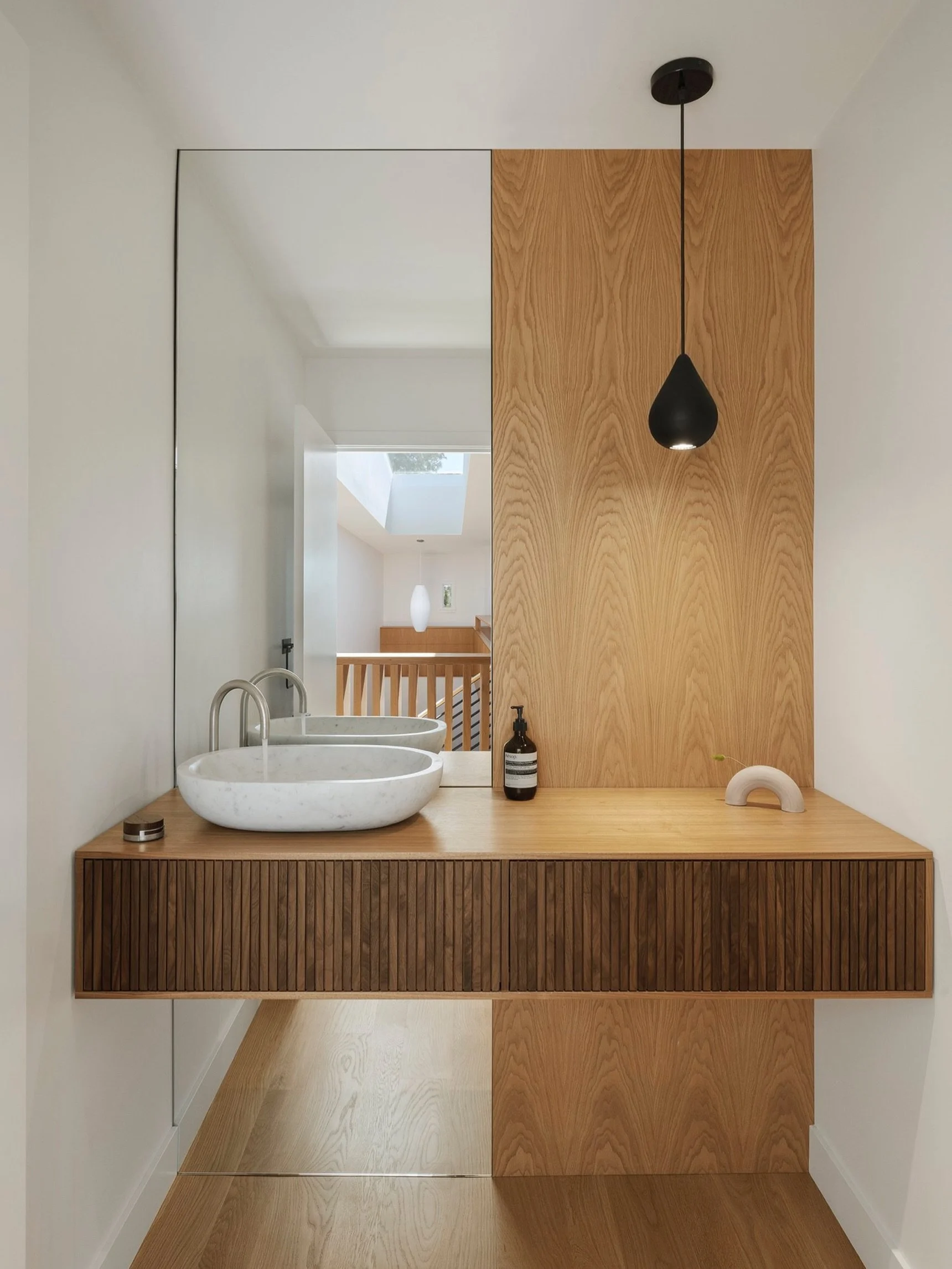 Great design isn&rsquo;t always about adding more&mdash;sometimes it&rsquo;s about creating the illusion of more.

A floor-to-ceiling mirror enhances natural light, adds visual depth, and makes even the smallest spaces feel effortlessly open and refi