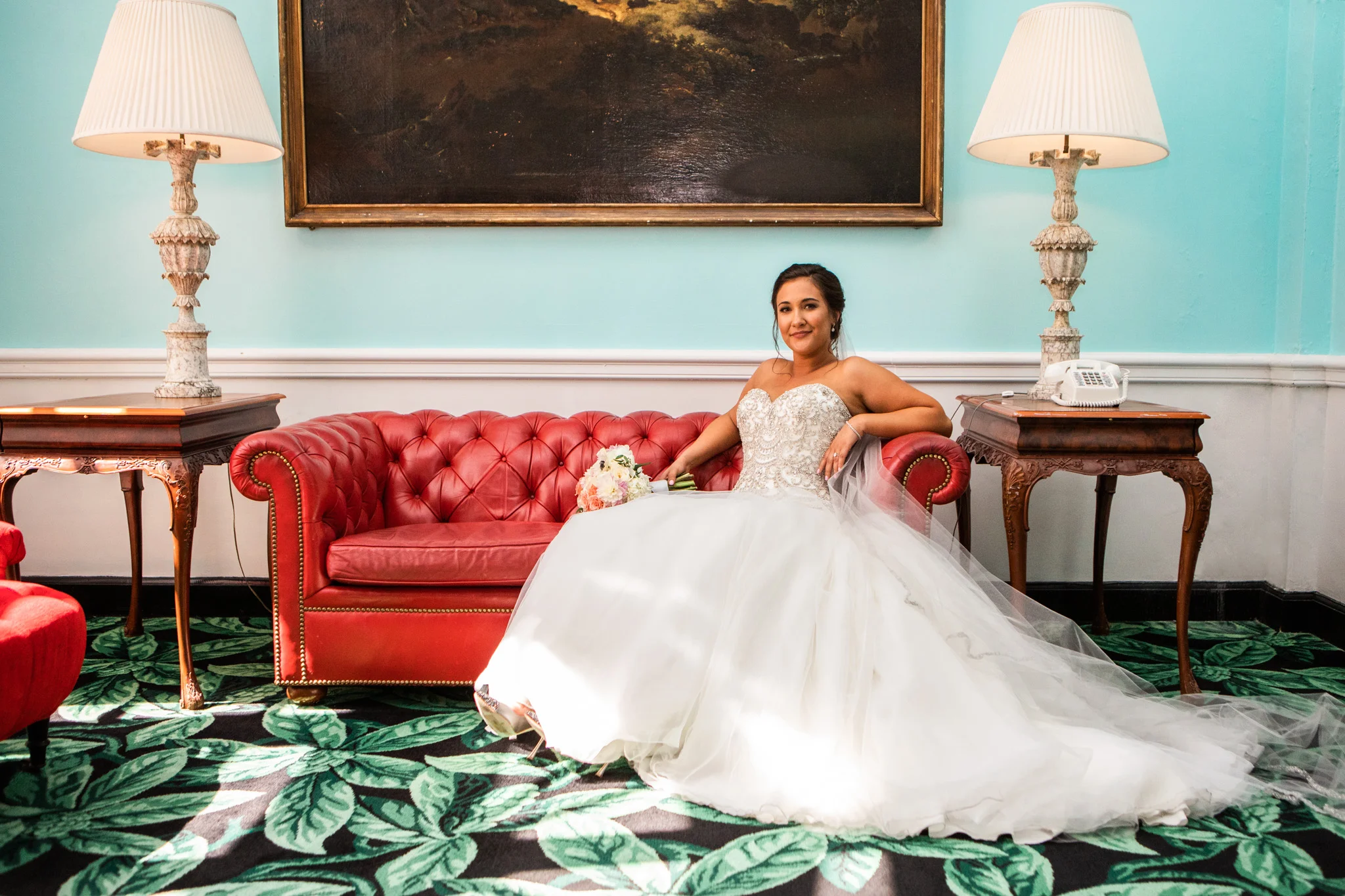 This red couch at the Greenbrier is iconic! I always make sure to take at least a few photos in this spot at each wedding.