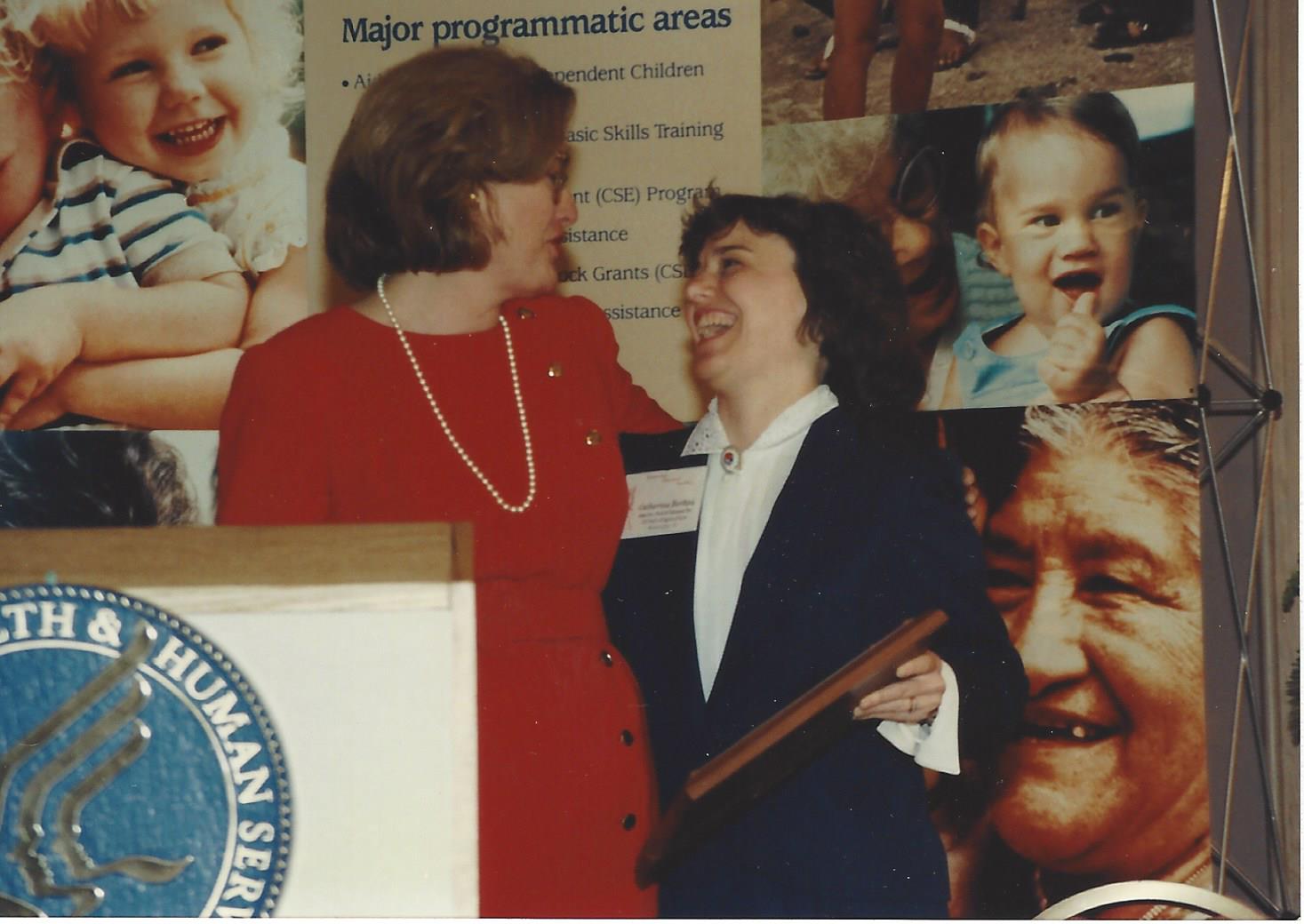  Receiving the American Public Welfare Association Leadership in Human Services Award with HHS Undersecretary Constance Horner (1990) 