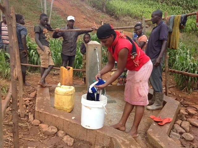 This women is  washing clothes.JPG