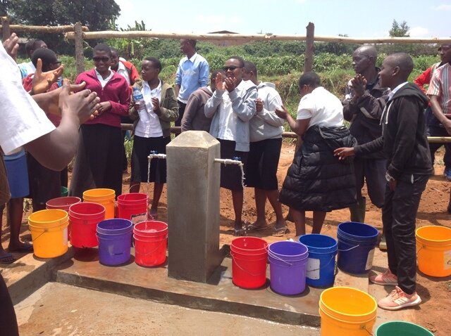the students at Rubanga they were very exited to have the clean water.JPG