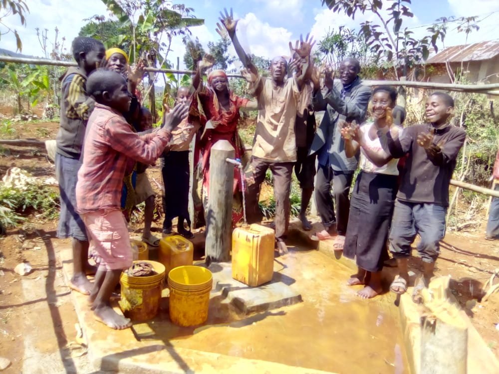 The people are very happy to get clean water.jpg