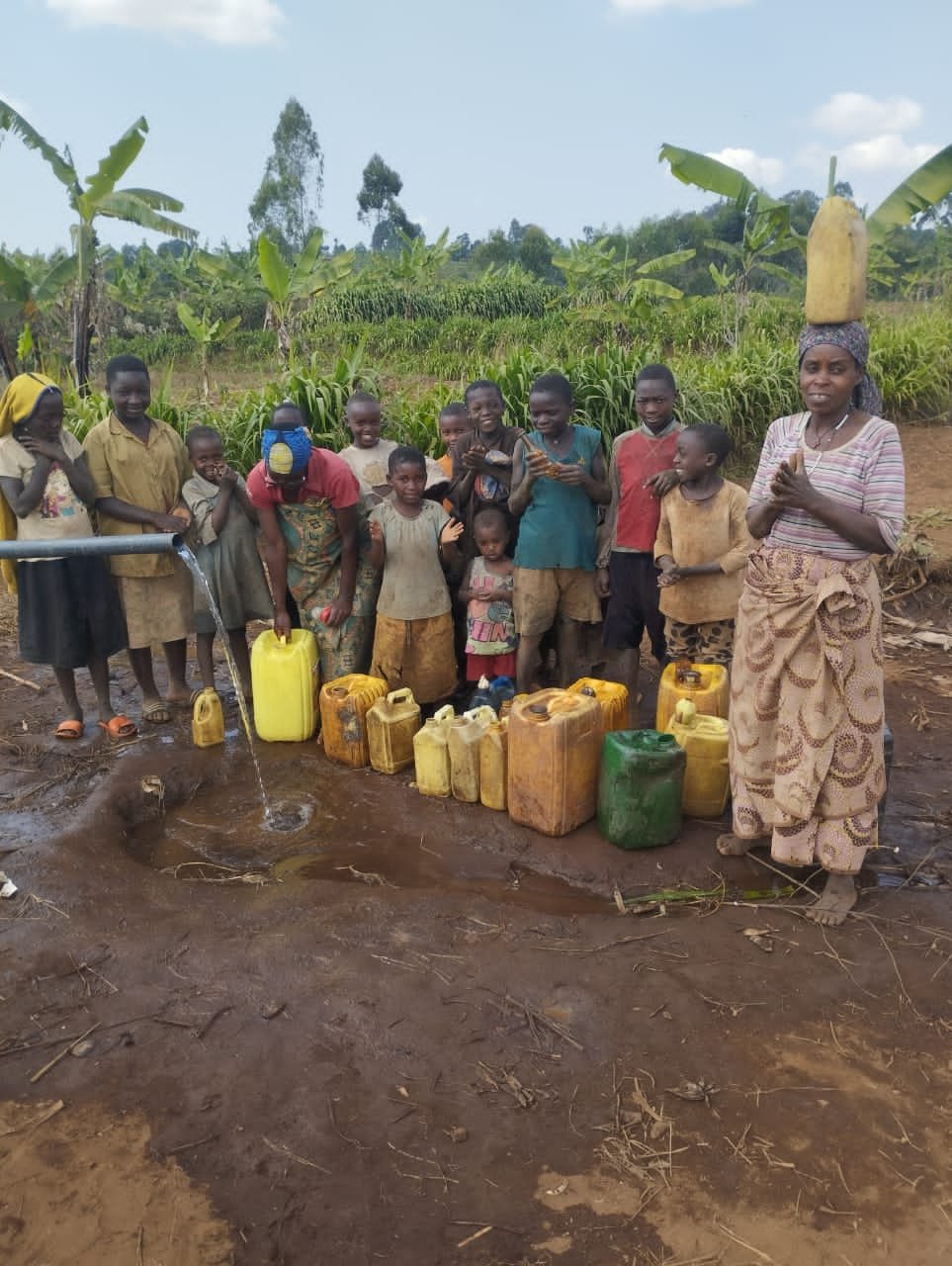 People are  happy to get clean water.jpg
