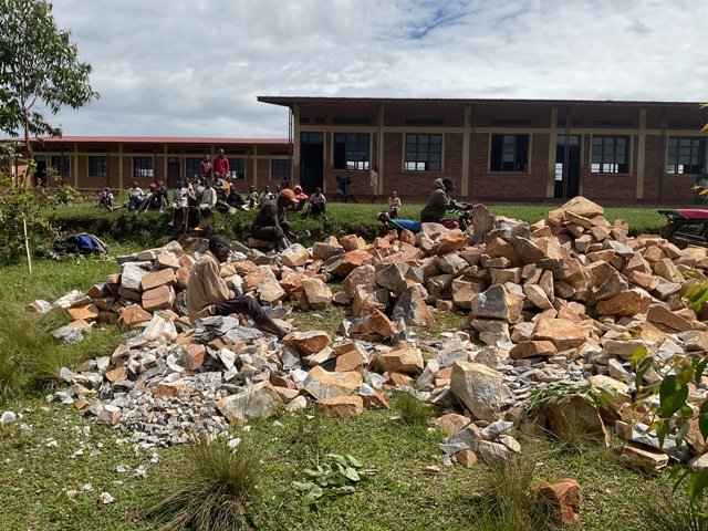 Stones for  tank construction at Kivyiname school.JPG