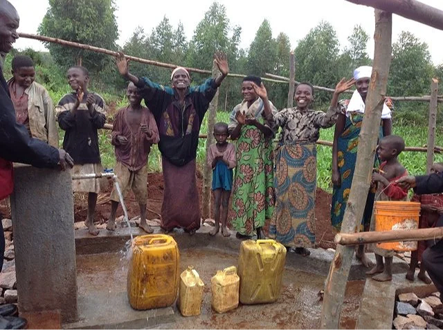 The+people+are+happy+to+get+clean+water.png