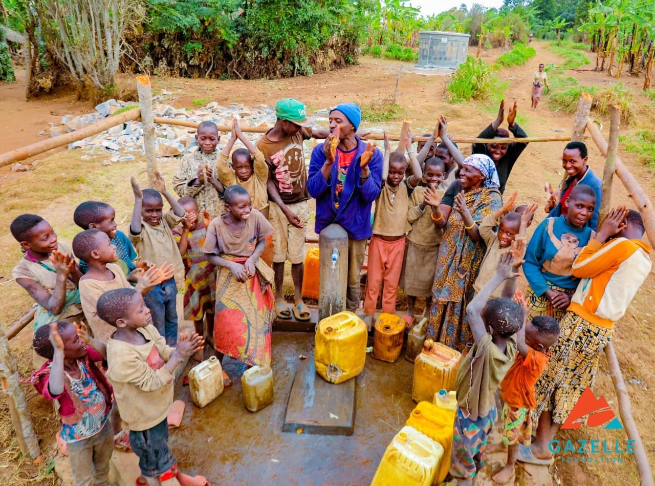 The people are very happy to get clean water.jpg
