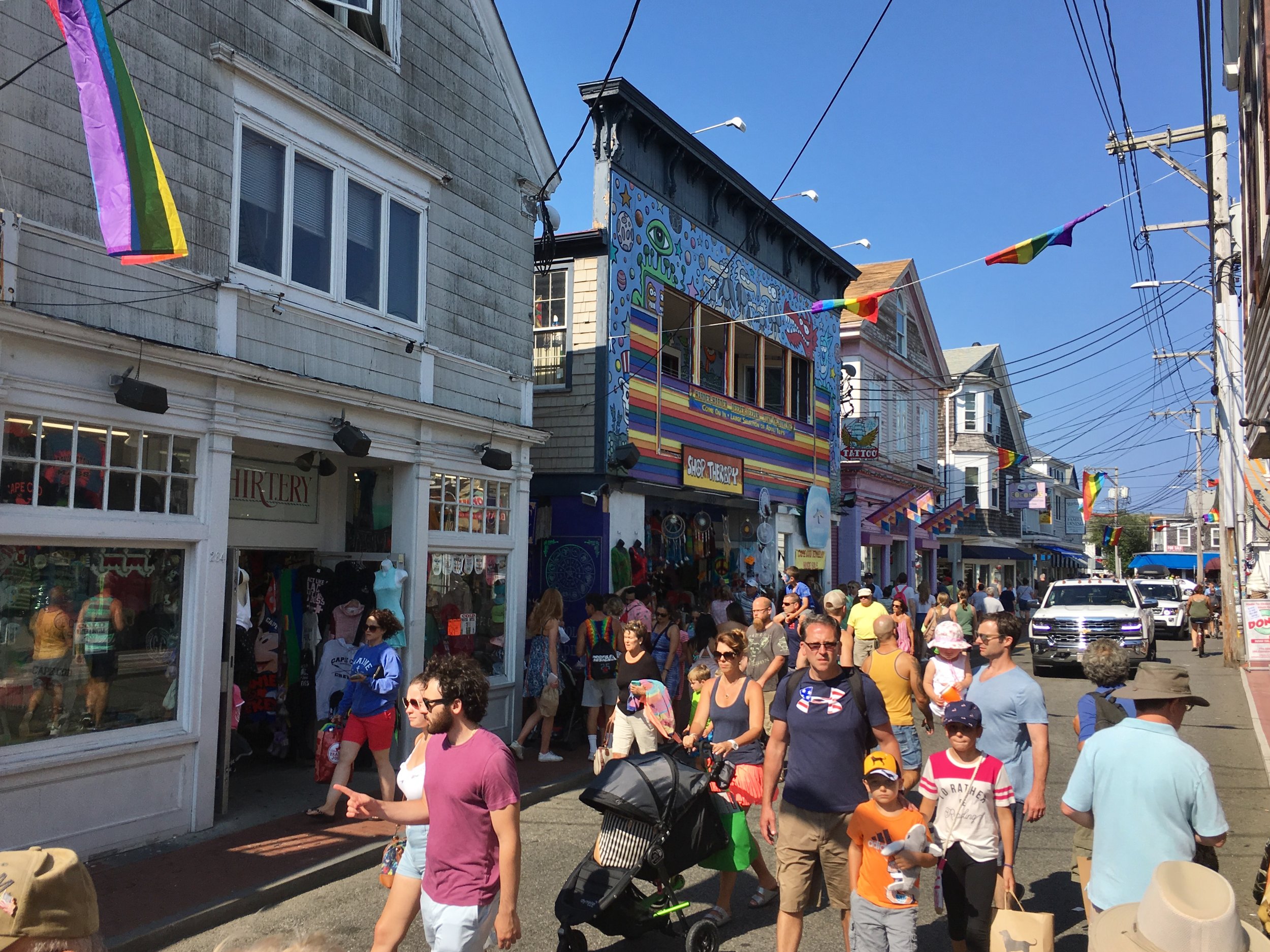 Commercial Street in Provincetown, MA, where cars are welcome but treated as guests. (Photo by the author)