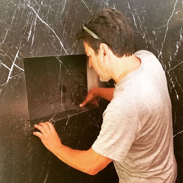 Hard at #work! Installing a #beautiful black #marble #slab for a #shower in another #satisfied #customers #dreamhome www.devitishomes.com we can do it all! #contractor #construction #remodeling #socal #losangeles #bathroom #mansions #doitrightthefirs