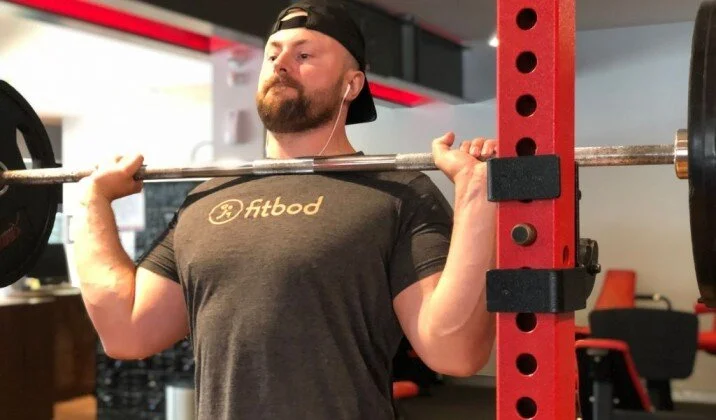Grabbing the bar too much with your hand while front squatting can cause wrist pain
