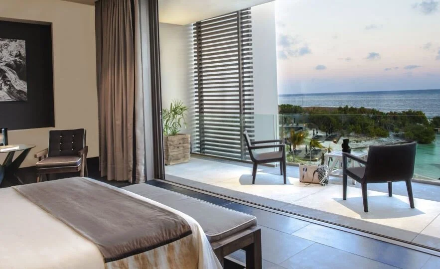 Pricing for March 2-7 for Ocean View Deluxe King with Terrace pictured above: $749.70 per night including taxes and fees and all listed benefits. Total of $3748.50.