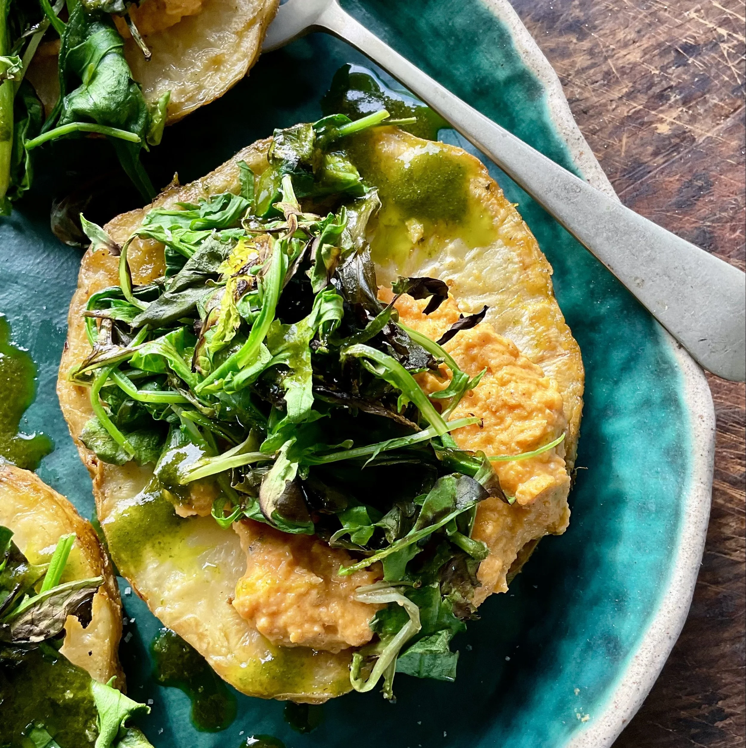 CELERIAC STEAKS WITH ROASTED CARROT HUMMUS &amp; CHARRED GREENS 