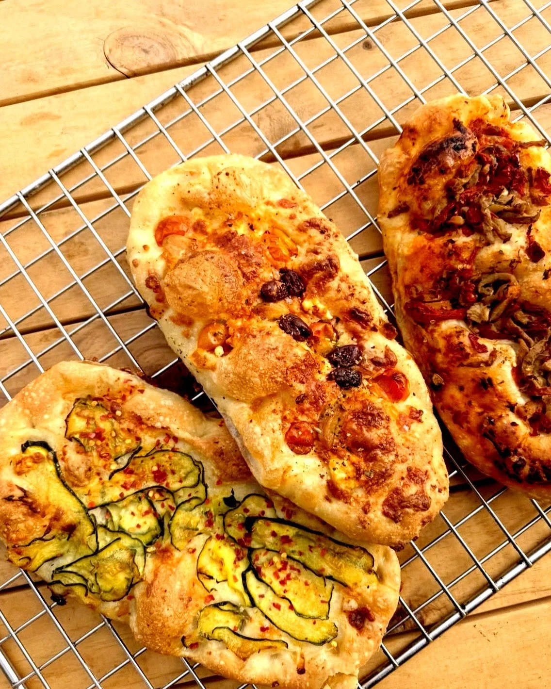 We love just working with the legends from @millers_bread_kitchen and reckon their foccacias (we call them flat breads) with seasonal toppings are quintessential summer holiday food ❤️❤️ ❤️ 

Each day their bakers are currently banging out these thre