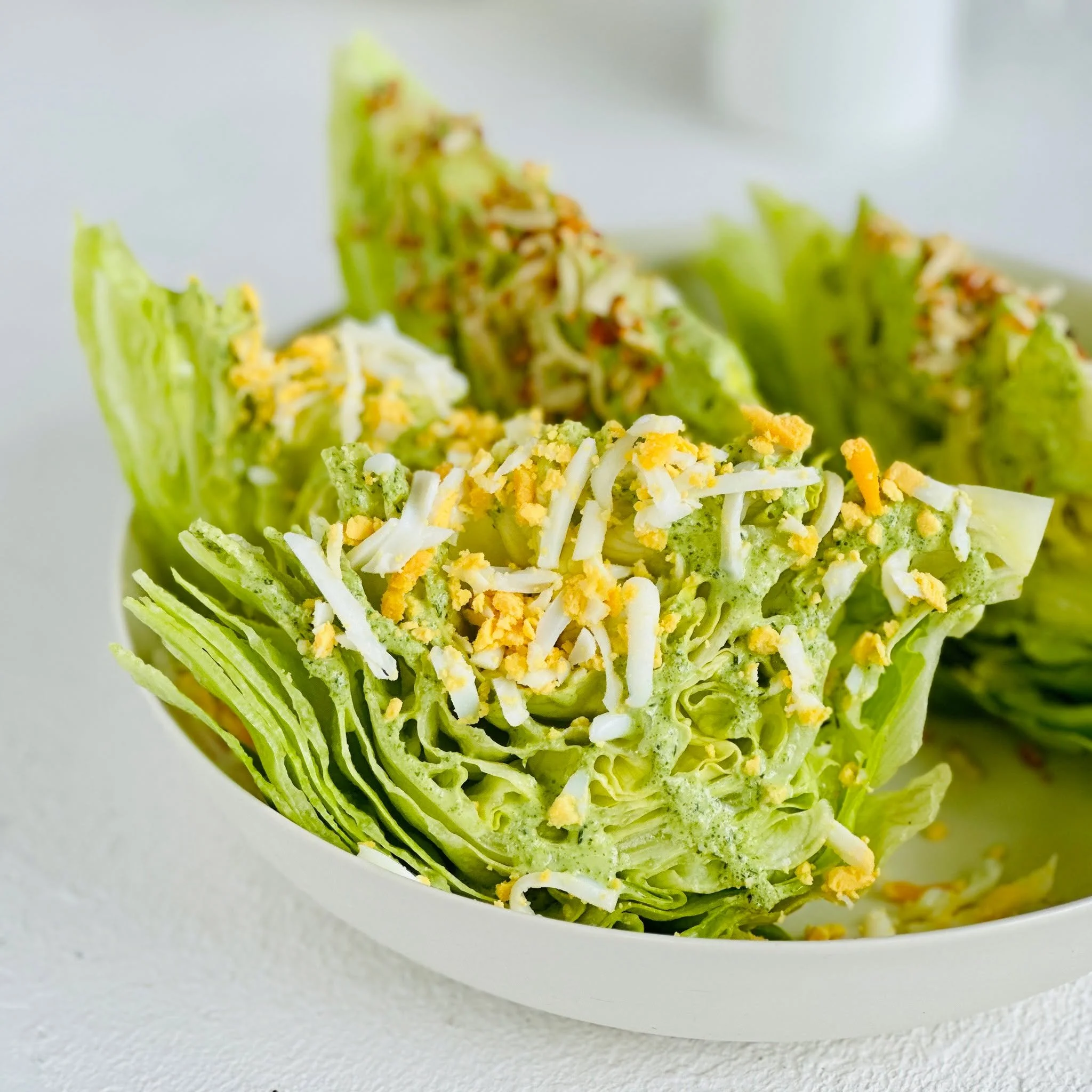 When you need a good looking salad to pull together at a moment&rsquo;s notice - this @fionahammondfood recipe will serve you well ❤️ 

Wedges of iceberg or cos lettuce are dressed with a tangy yoghurt dressing, and then dressed up with a tasty toppi