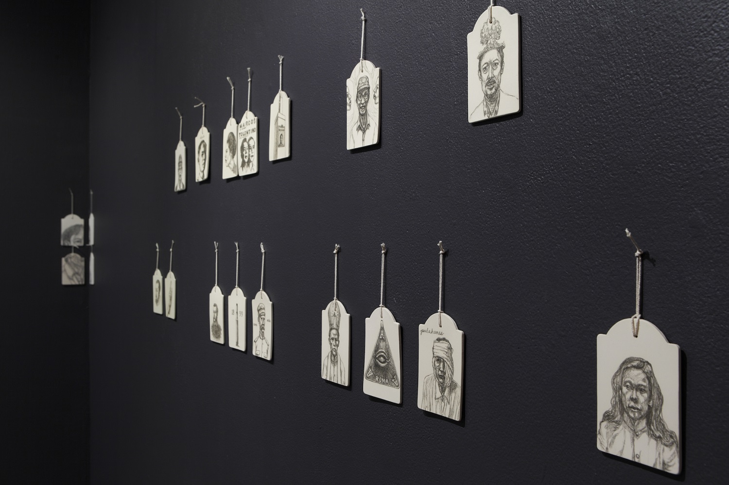 How to catch a shapeshifter (detail), stoneware, underglaze, porcelain, refractory bricks, and string, variable sizes, 2015 Dress me featherless , group exhibition, Northern Centre for Contemporary Art, Darwin, Australia Photography by Fiona Morrison, courtesy of Northern Centre for Contemporary Art