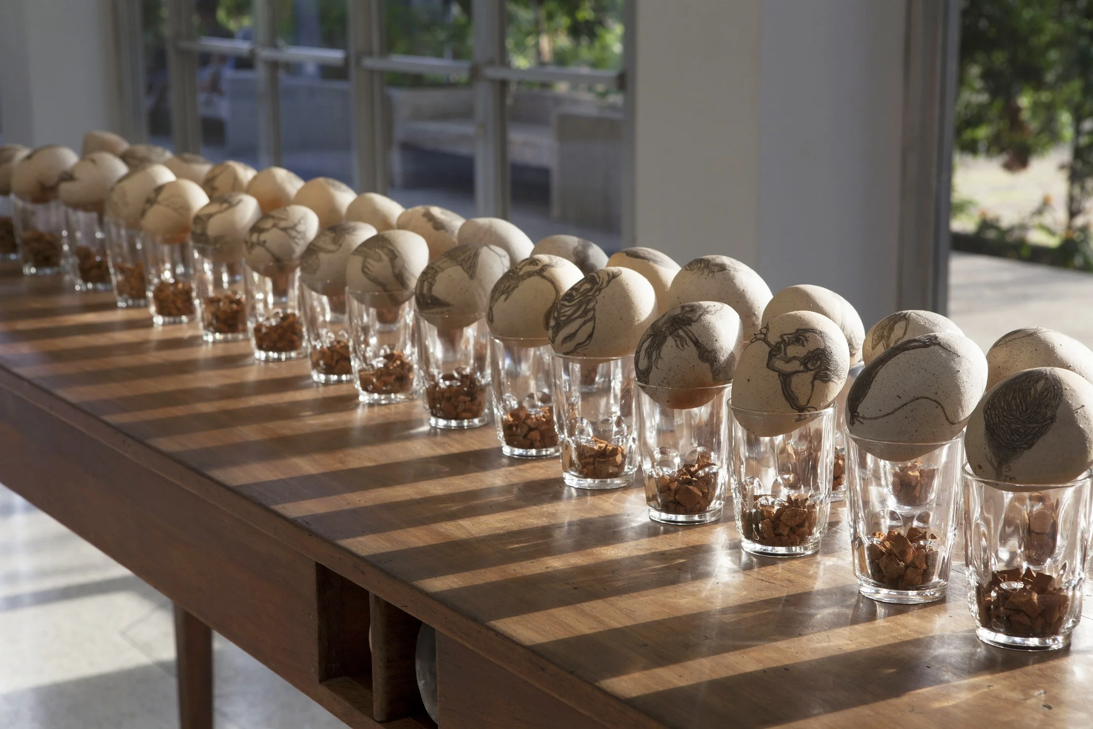 32 Eggs (detail), stoneware with underglaze, terracotta shards, glass, 2015