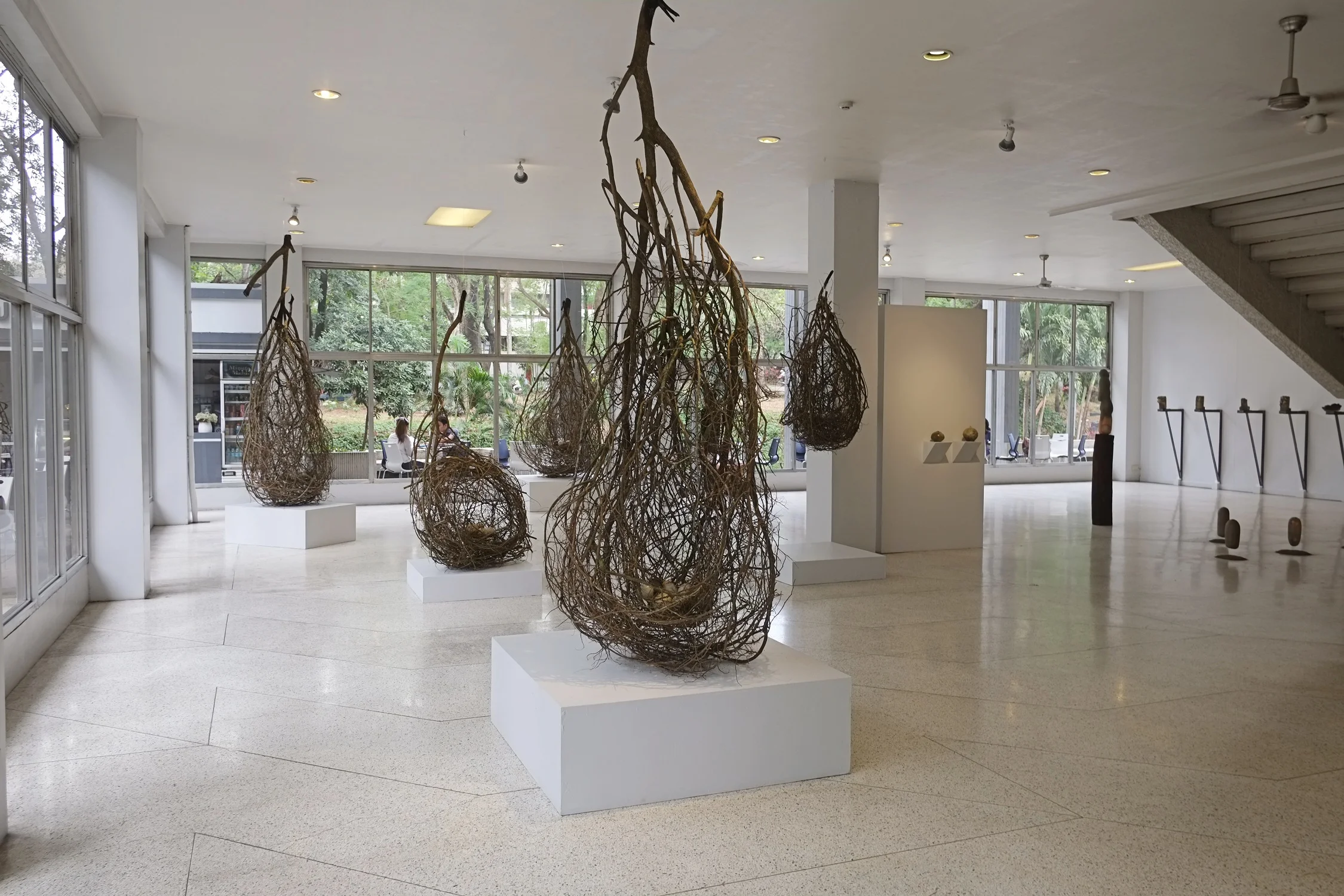 Nesting, Pablo K. Capati III and Mark Valenzuela (assisted by Benji Ranada) stoneware clay, underglazes, ash glazes, twigs, 2015