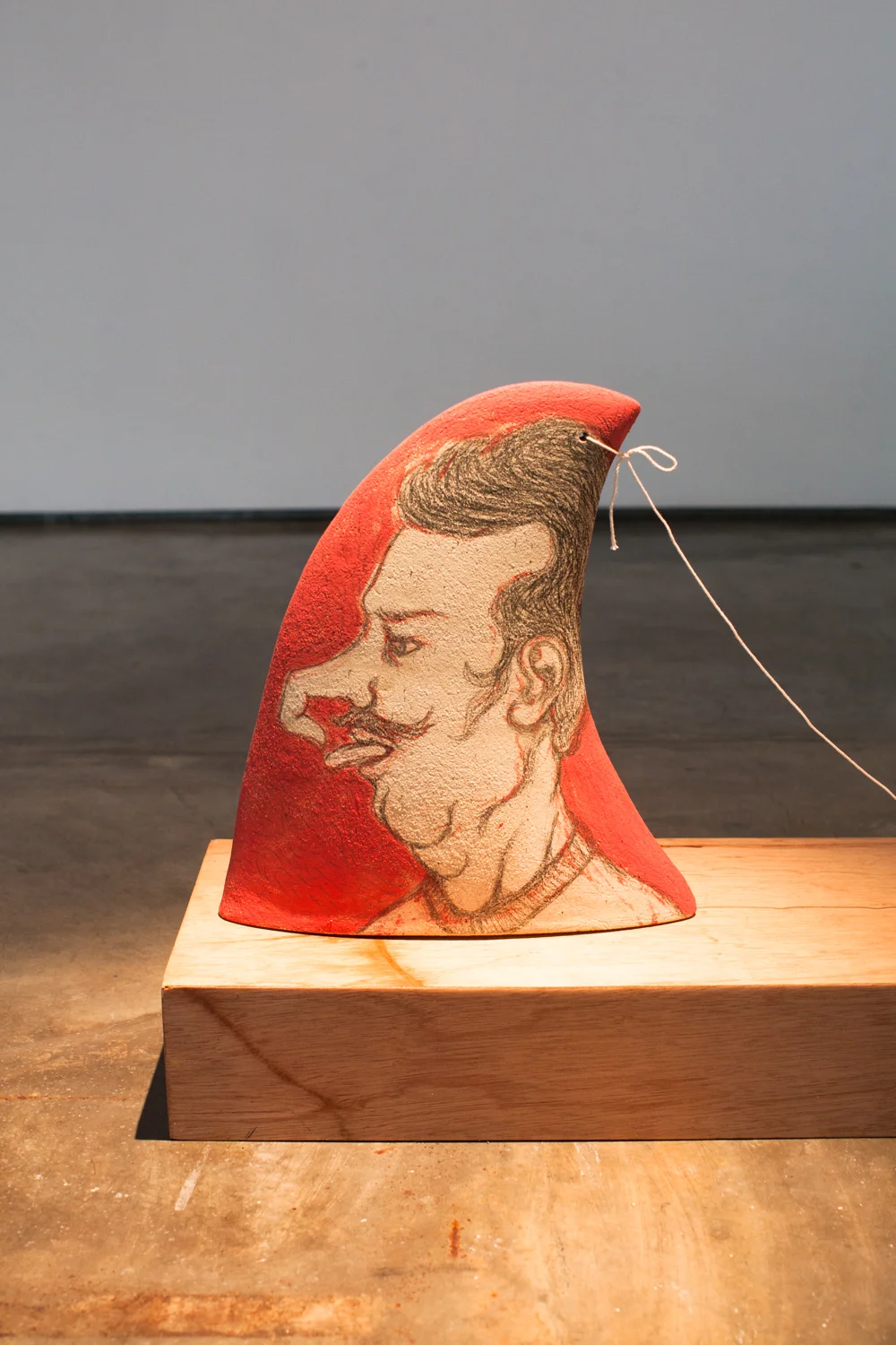 Cheap Tricks , detail, stoneware clay with underglaze and stain, wood, and string, 2018
