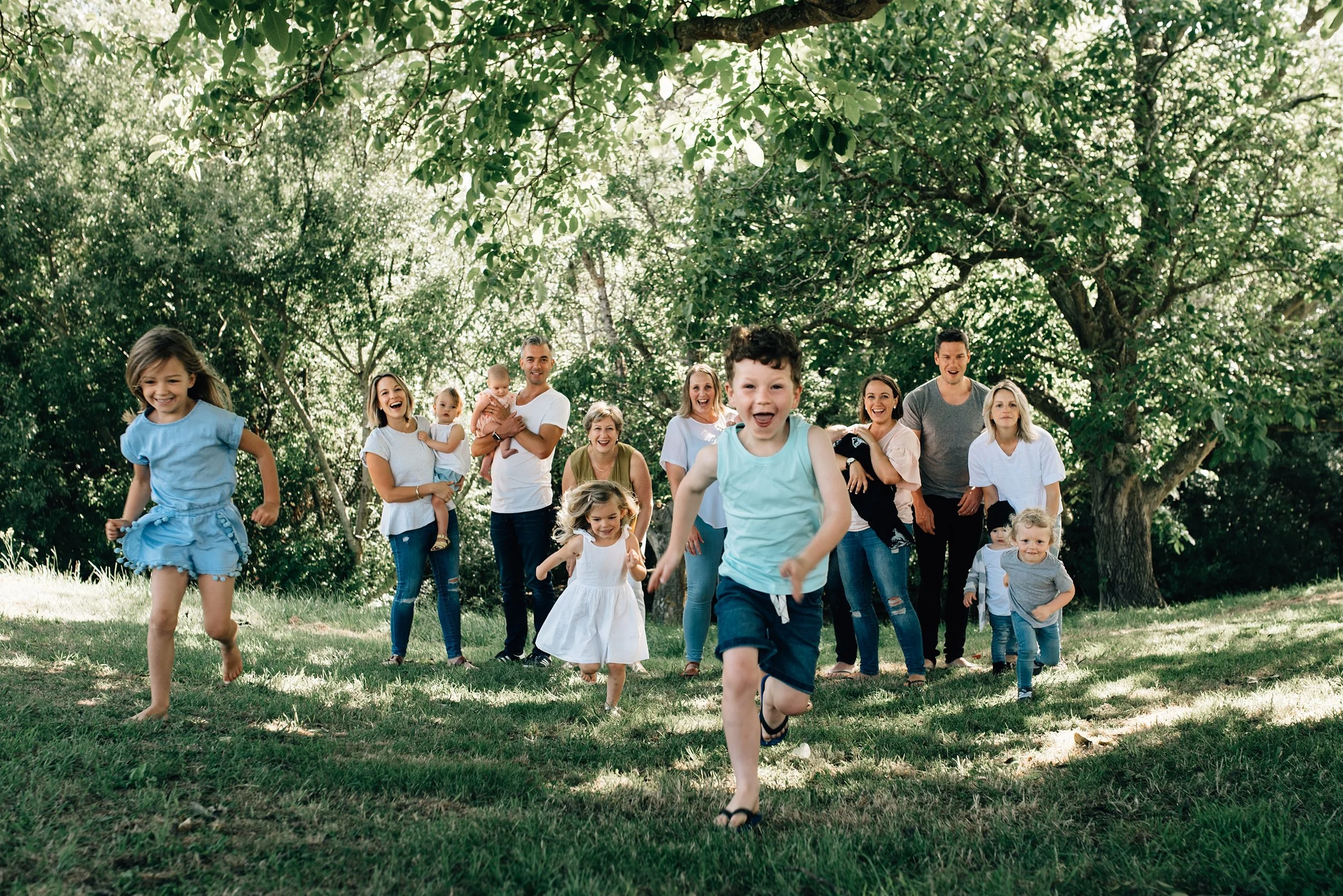 Extended family photography having fun at the park in Christchurch New Zealand