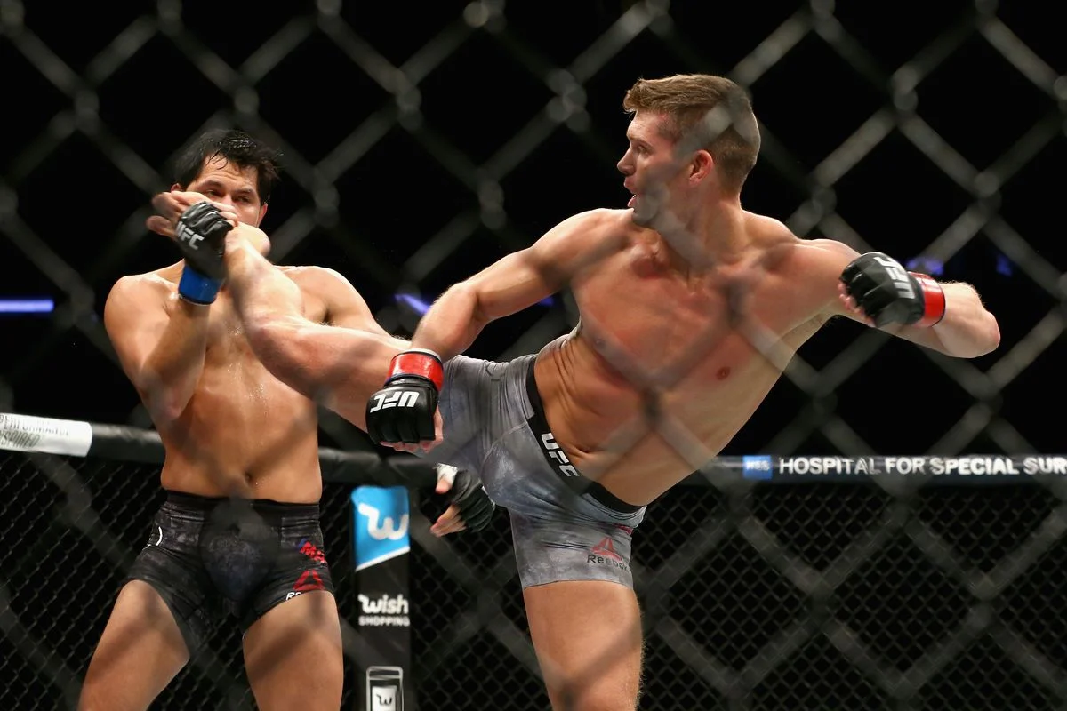 Thompson vs. Masvidal (via Mike Stobe/GettyImages)