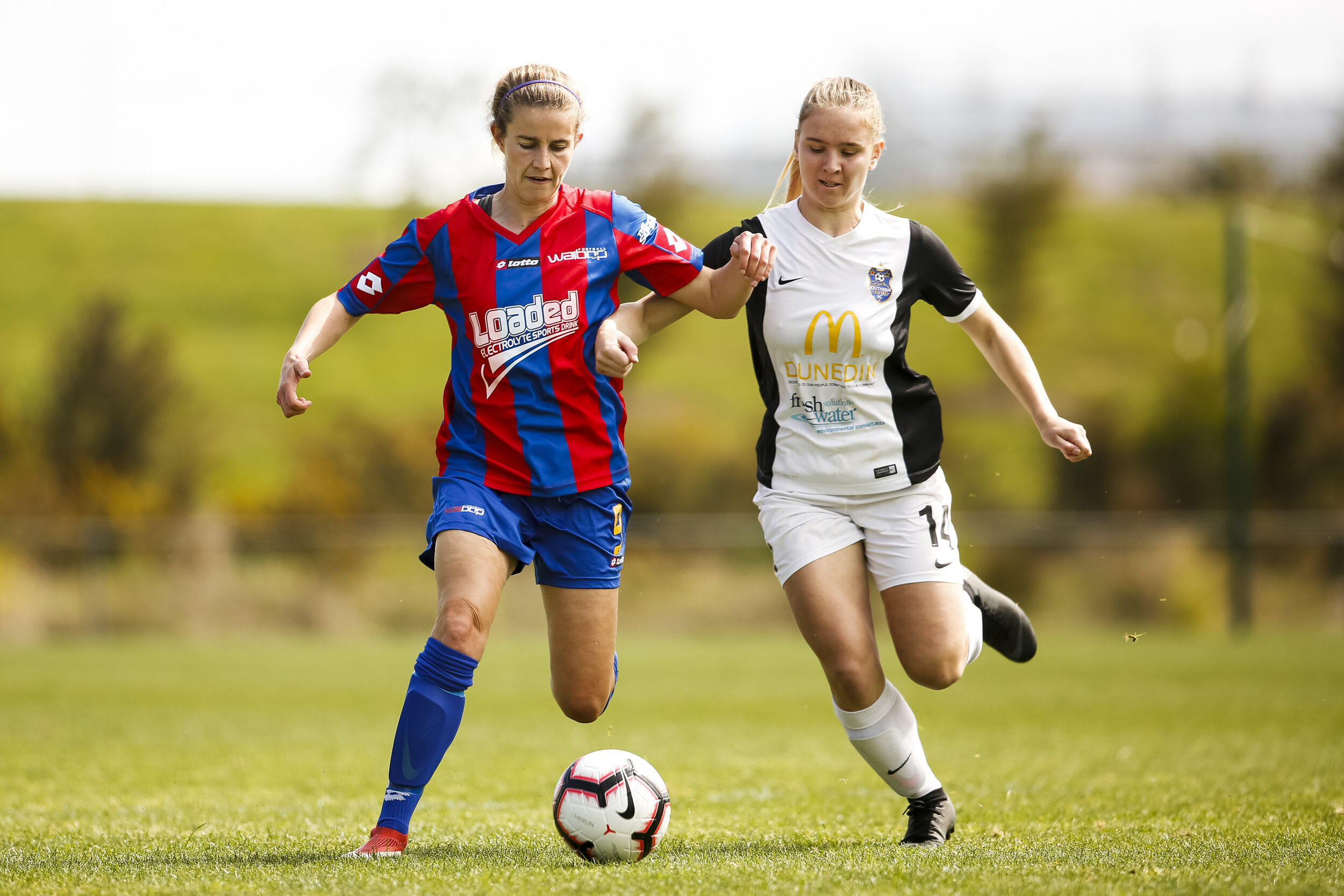  Helen Talbot of WaiBOP challenges Lara Wall of Southern. Southern defeat Waikato Bay of Plenty 6-3 in the National Women's Football League Match Day 4. McLennan Park, Papakura. October 7, 2018. Copyright photo: Alisha Lovrich / www.photosport.nz 