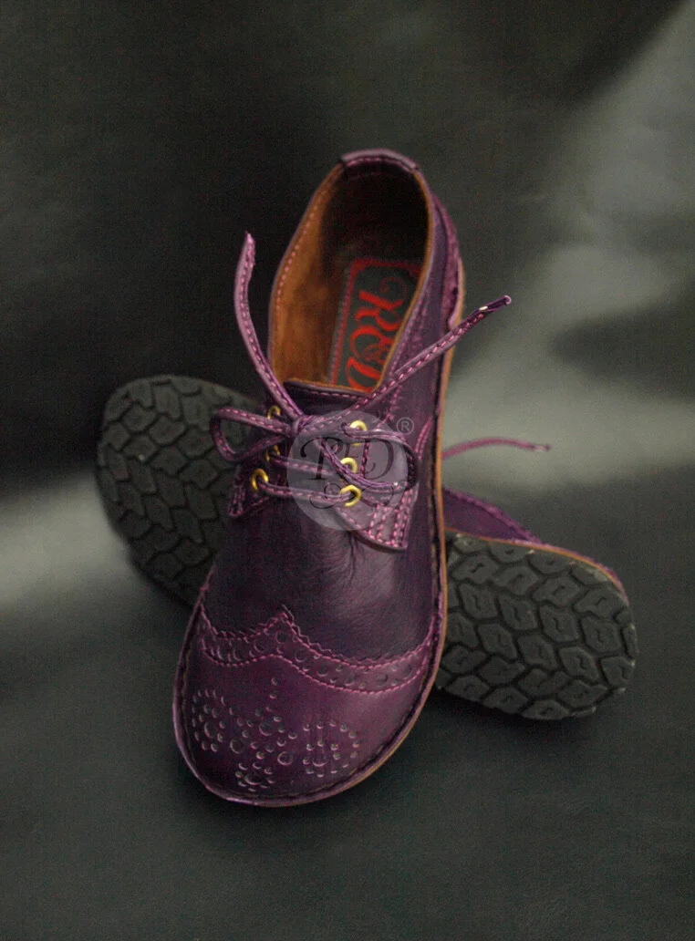 purple brogues