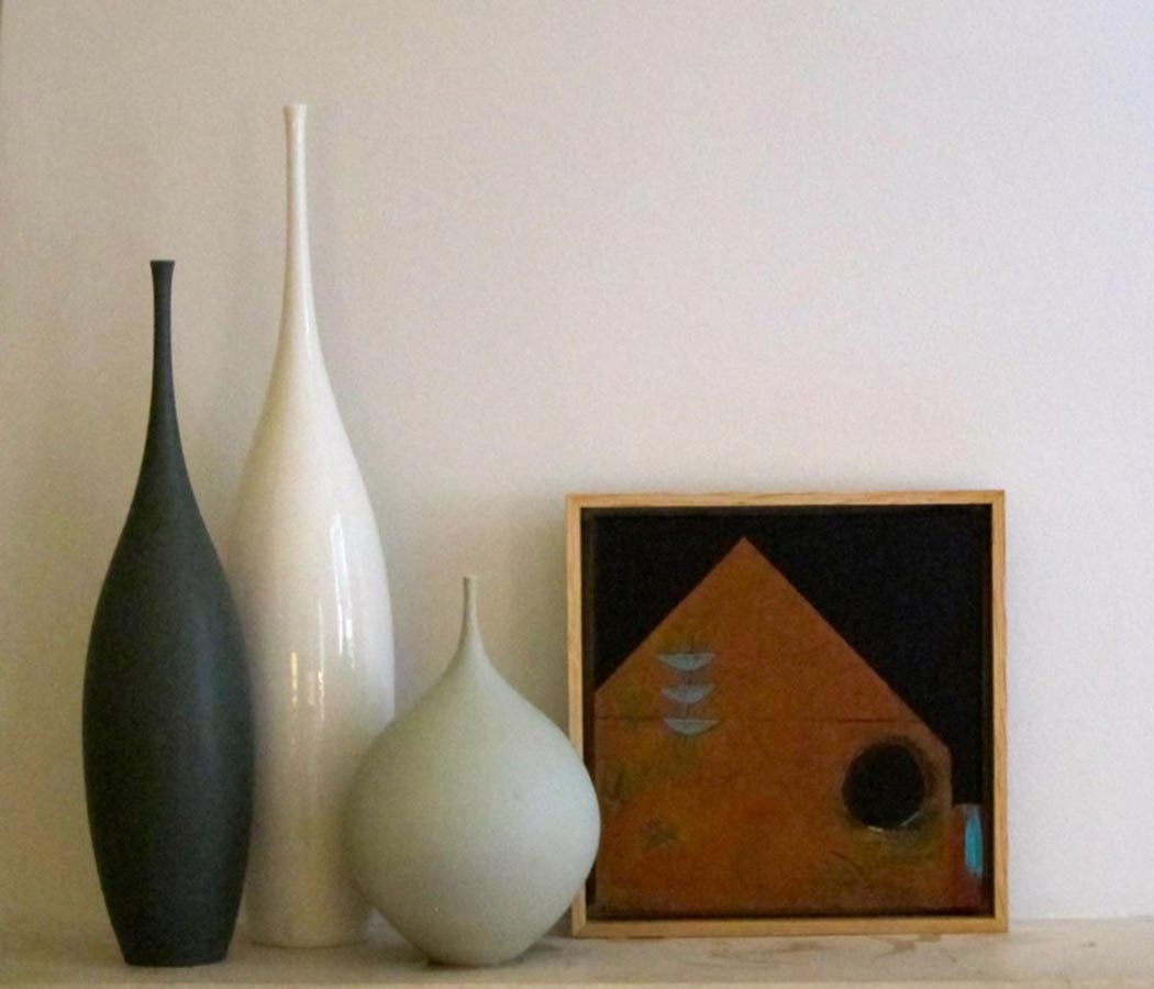 Three Boats and a Black Moon complimented by beautiful ceramic vessels by Sophie Cook