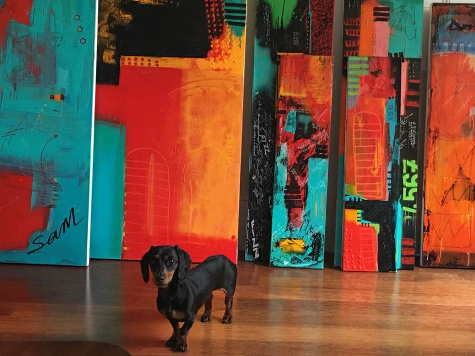 Little Ben now fully recovered in front some of the abstract work that has sold during this past year.