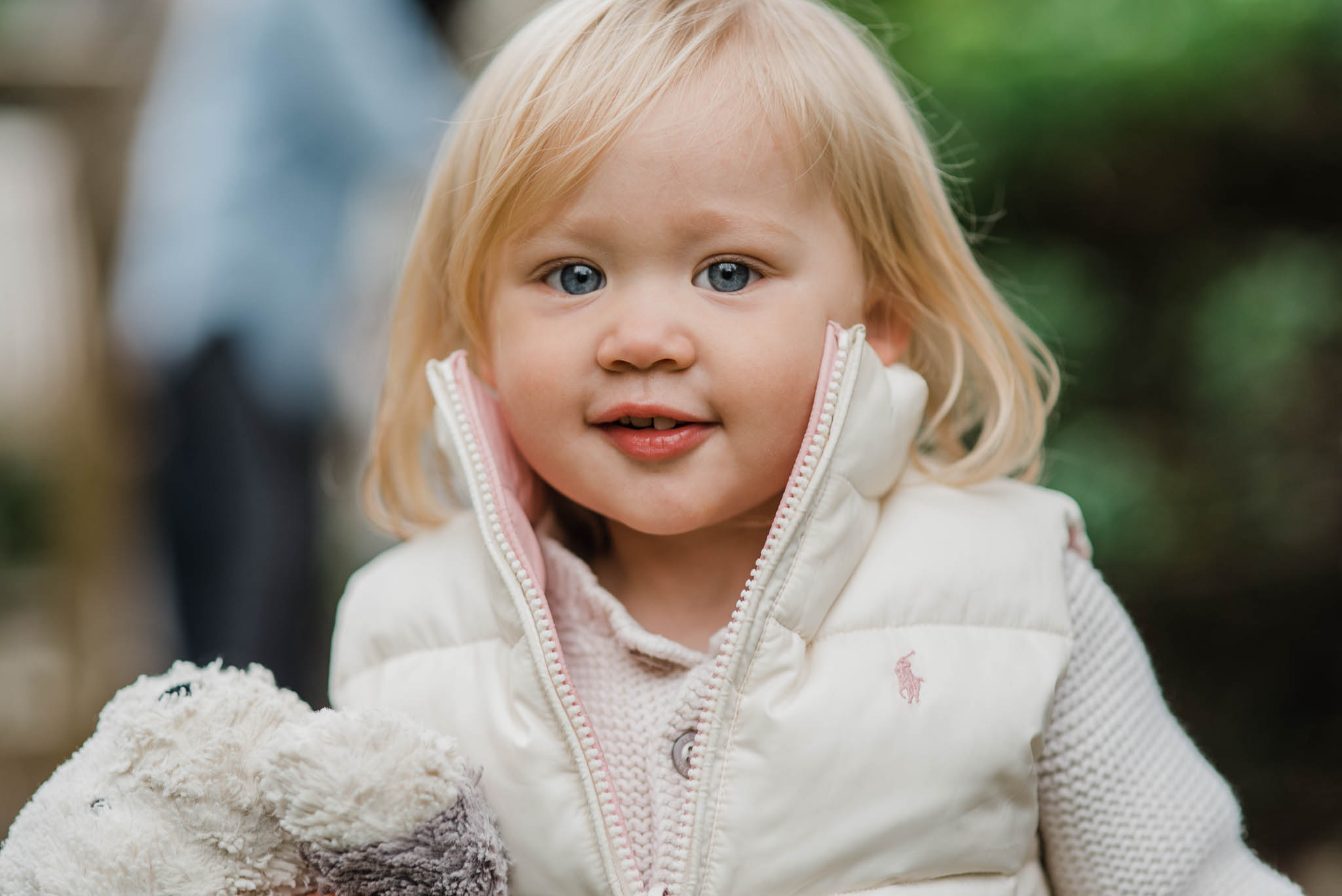 Toddler girl with cuddly toy.jpg