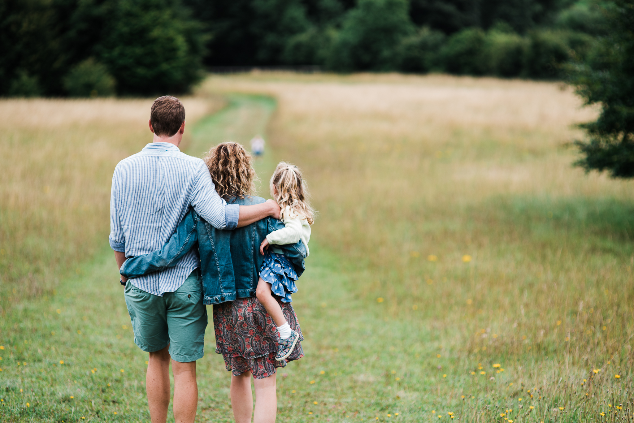 Family walking down hill - Cotswold Family Photo.jpg