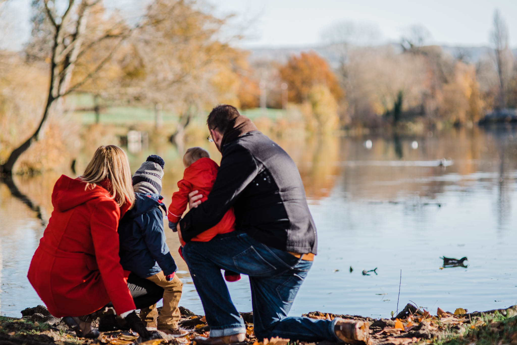 Family of four by lake pittville park family photoshoot Cheltenham.jpg