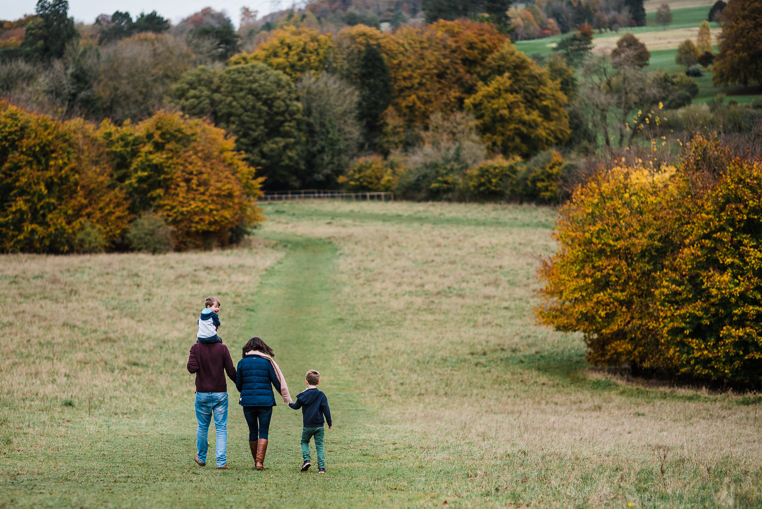 Family walking down hill - Cheltenham Family Photographer.jpg