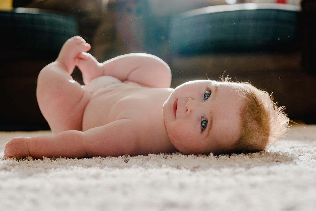 Baby boy lying down - cheltenham in home photoshoot.jpg