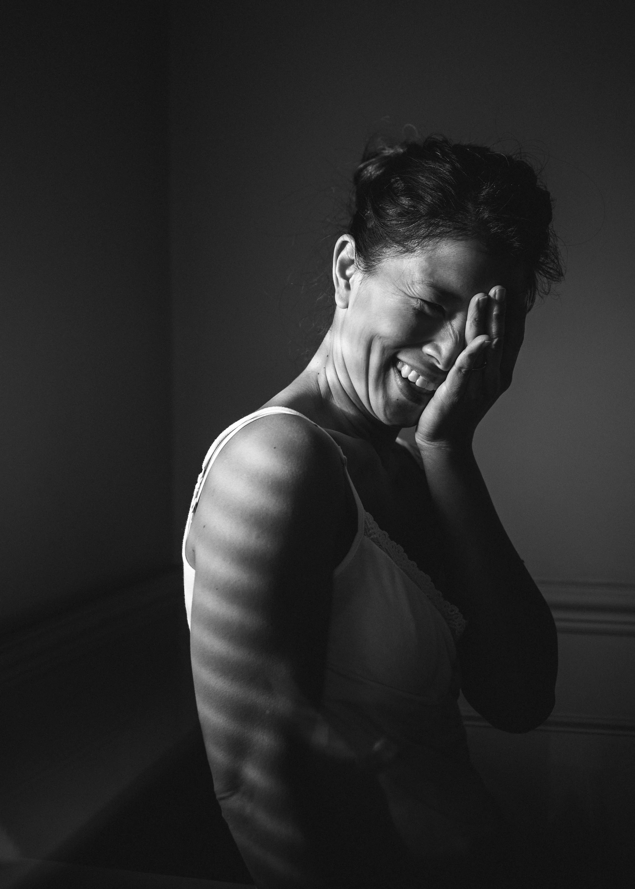 Self-portrait taken in natural light, showing a relaxed, authentic expression and on brand