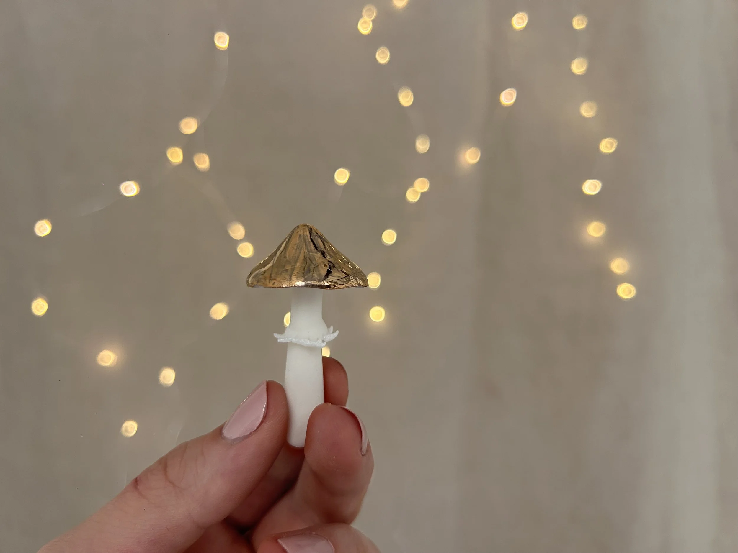 Porcelain gold mushroom decoration close.jpg