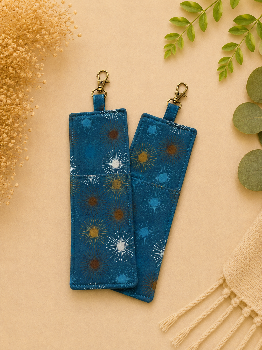 Teal Starburst Fabric Pouches with Brass Clasps.png