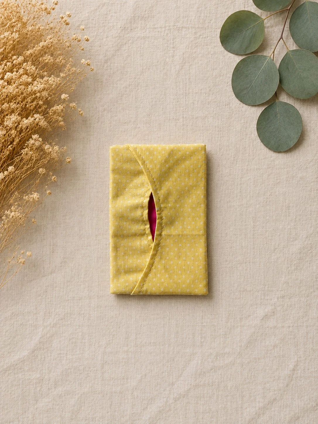 tissue cover yello.jpeg