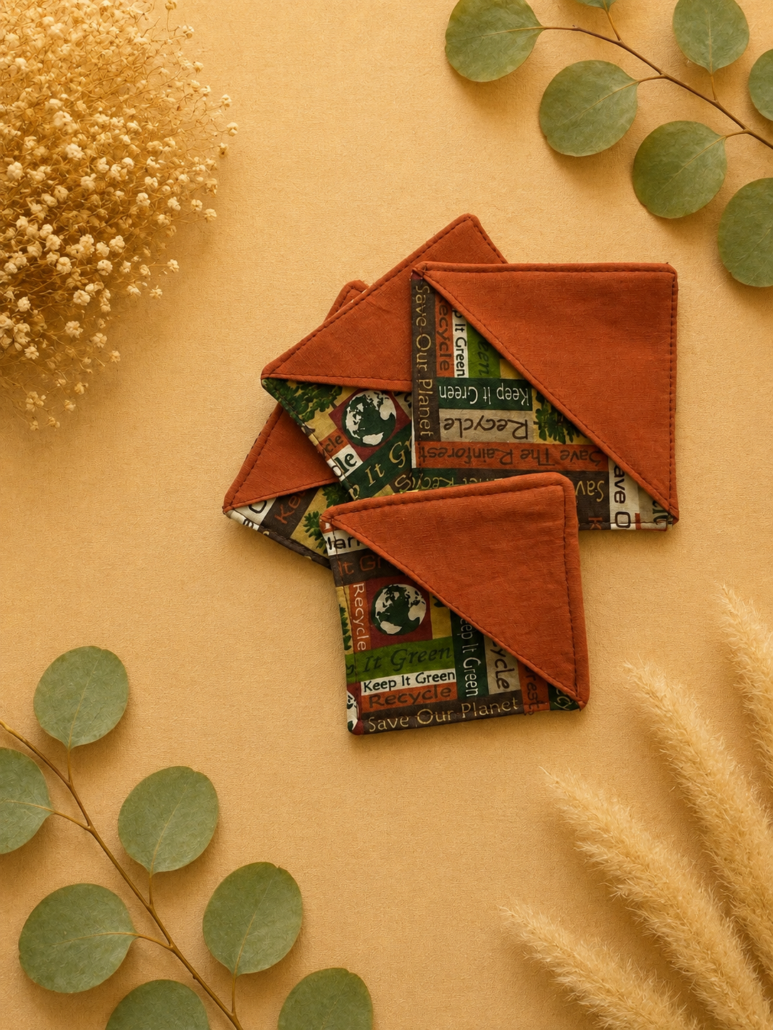 Eco-Friendly Fabric Coasters with Botanical Accents.png