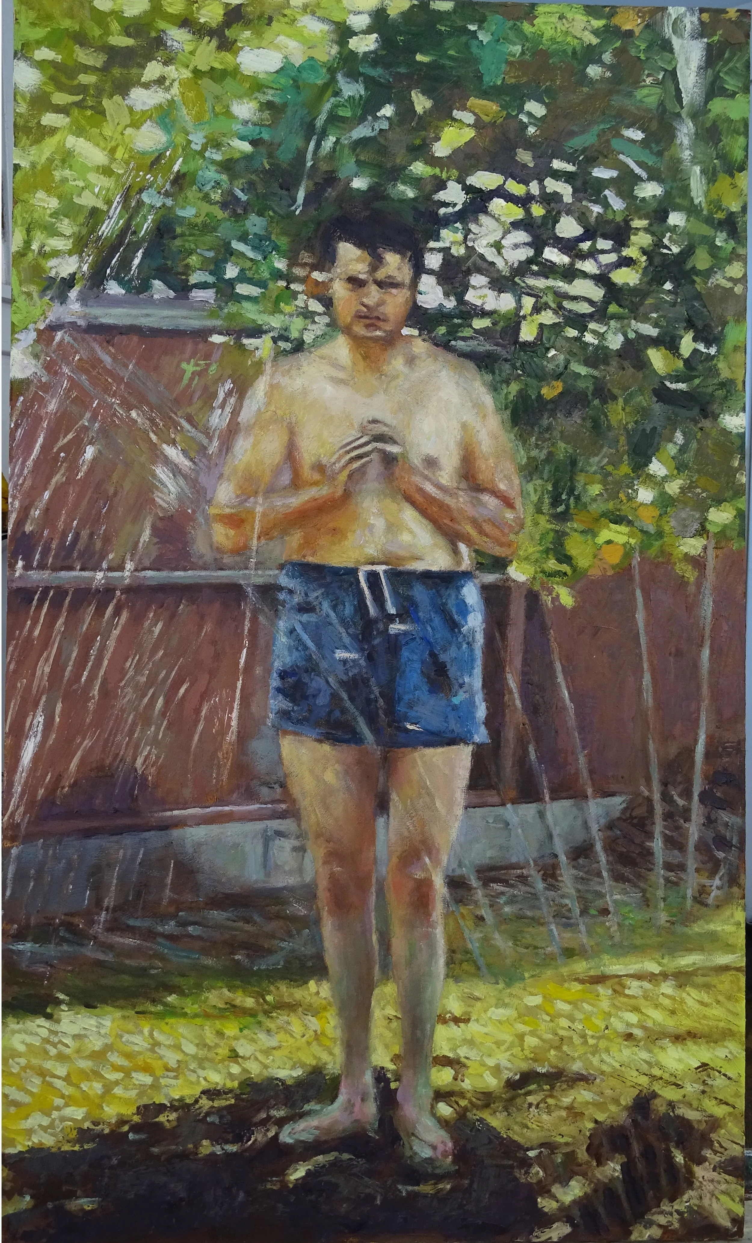 Dad in the sprinkler.JPG