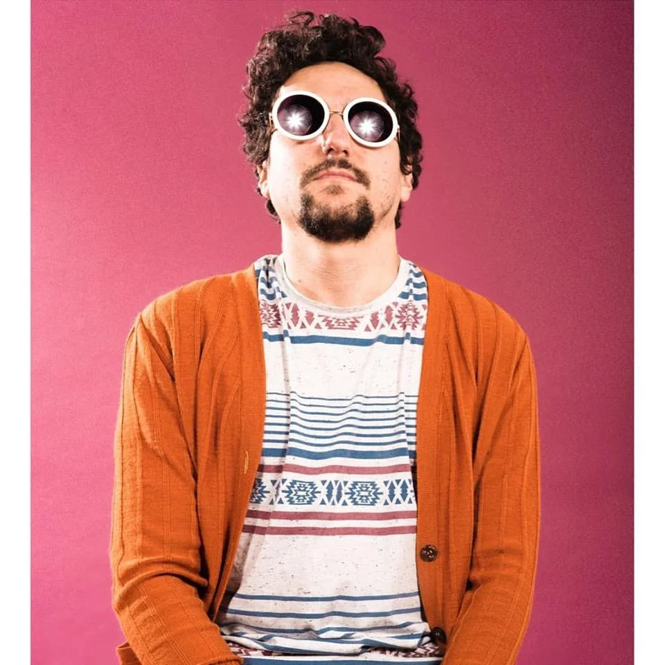 Image may contain- 1 person, sunglasses, stripes and closeup.jpeg