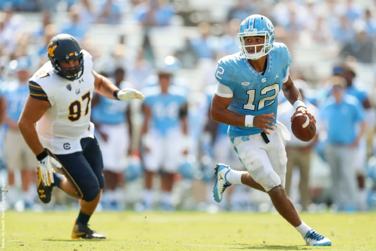 Chazz Surratt (12) spelled Brandon Harris after two series, but both quarterbacks were victims of Larry Fedora's quarterback carousel.