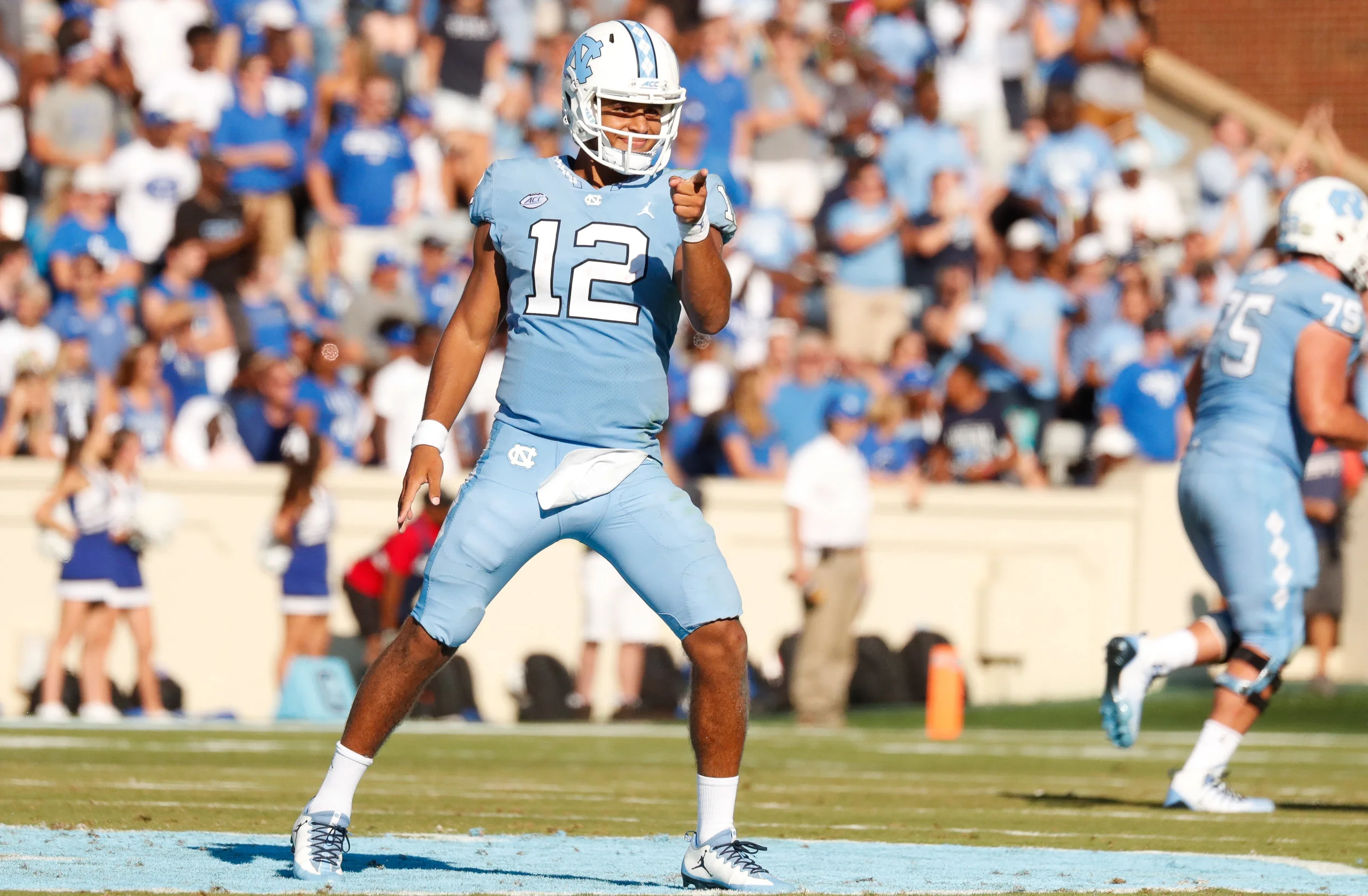 Chazz Surratt (12) set career highs in passing yards (259) and rushing yards (77). But it's the extra plays he tried to make that cost UNC against Duke.