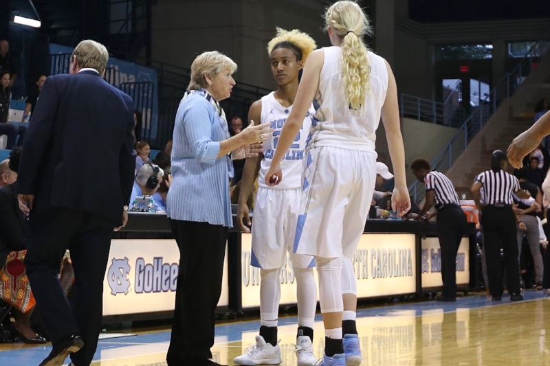 North Carolina head coach Sylvia Hatchell (left) talks to guards Paris Kea (22) and Taylor Koenen (1) during a timeout early in the season.